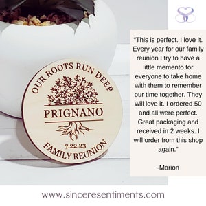 May include: A round wooden plaque with a tree design and the text "Our Roots Run Deep" and "Family Reunion". The plaque is personalized with the name "Prignano" and the date "7.22.23".