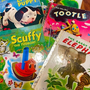 May include: A collection of five Little Golden Books featuring illustrated covers: The Poky Little Puppy, Tawny Scrawny Lion, Tootle, Scuffy the Tugboat, and The Saggy Baggy Elephant. Each hardcover book displays colorful character artwork and bold titles.