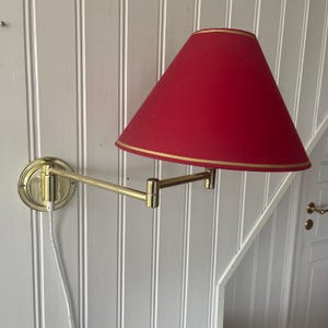 Vintage swinging brass wall lamp IKEA Sweden