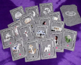 May include: A spread of Lenormand cards, a type of fortune telling deck, with images of a ship, moon, fish, birds, child, bouquet, woman, cross, house, letter, man, clover, anchor, dog, and rider.