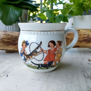 Vintage Porcelain Children&#39;s Cup: Hula Hoop Cat Graphic