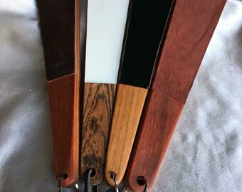 Hand crafted BDSM slim line leather and exotic wood paddle