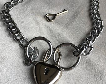 Heart locking collar, with a polished chrome chain.