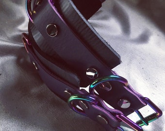 Leather cuffs, beautiful rainbow parts along with this genuine black and purple Latigo leather