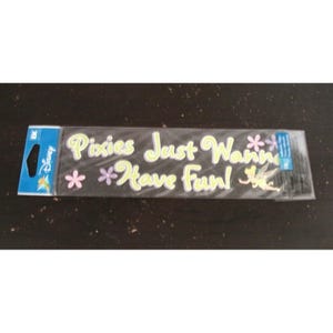 May include: A package of Disney stickers featuring the phrase "Pixies Just Wanna Have Fun!" in light green and white. The stickers include pink and purple flowers and a Tinkerbell graphic. The package has a blue Disney logo.
