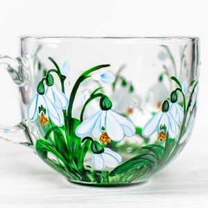 Hand painted January birth flower mug with snowdrop flowers on clear glass, personalized floral gift for January birthday.