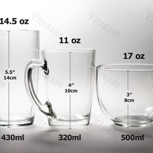 May include: Three clear glass mugs of varying sizes. The largest mug is 5.5 inches tall and holds 14.5 oz. The medium mug is 4 inches tall and holds 11 oz. The smallest mug is 3 inches tall and holds 17 oz.