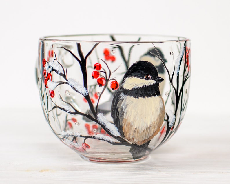 Birdwatcher gift mug shown in hand on wooden table.