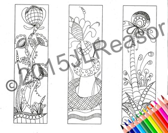May include: Three black and white line art bookmark designs. The first bookmark features a stylized flower with a large circular center. The second bookmark features a stylized mushroom with a large circular top. The third bookmark features a stylized palm tree with a large circular top.
