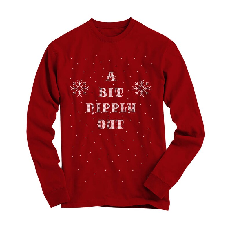 May include: Red long-sleeve shirt with a white snowflake pattern and the text "A Bit Pipply Out" in a pixelated font.