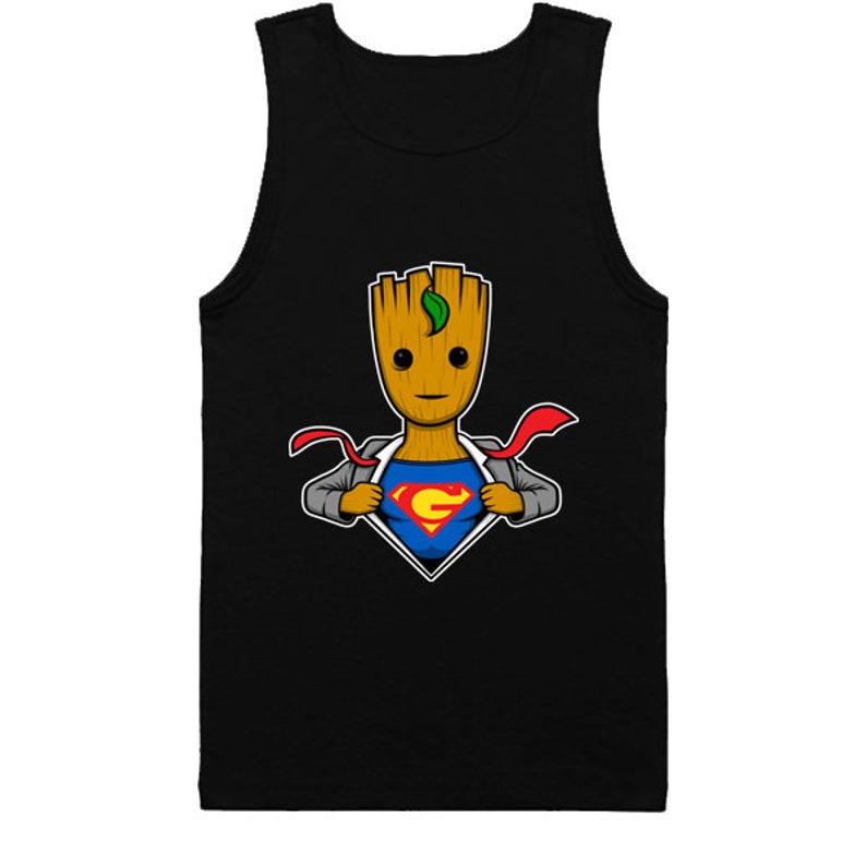 May include: A black tank top with a cartoon image of a tree-like character wearing a suit and revealing a Superman logo underneath. The character has a green leaf on its head.