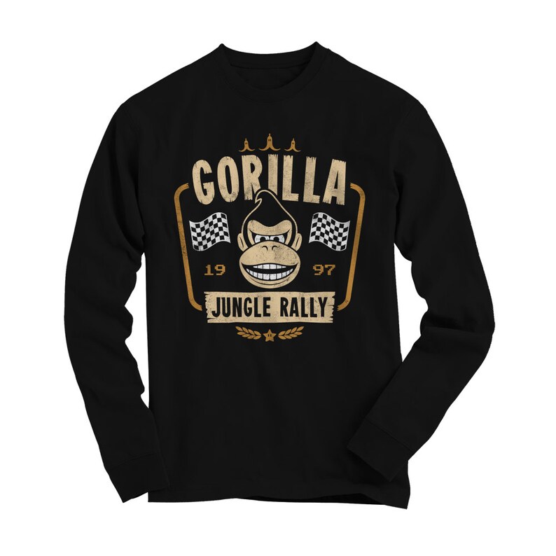 May include: Black long-sleeve t-shirt with a vintage-style graphic of a gorilla wearing racing goggles and a checkered flag. The graphic says "Gorilla Jungle Rally" with the numbers "19" and "97" on either side of the checkered flags.