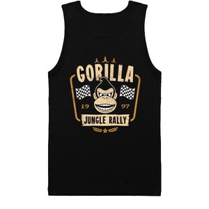 May include: Black tank top with a vintage-style graphic of a gorilla wearing a racing helmet and holding a checkered flag. The graphic says "Gorilla Jungle Rally" with the numbers 19 and 97 on either side.