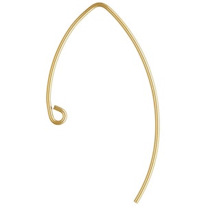 May include: Gold-toned earring with a teardrop shape and a small loop at the top.