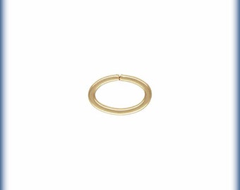 May include: A gold jump ring, a small metal ring used for connecting jewelry components.