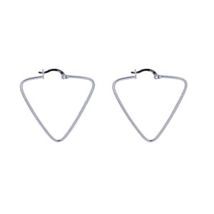 May include: A pair of silver triangle hoop earrings. The earrings are simple and modern in design.