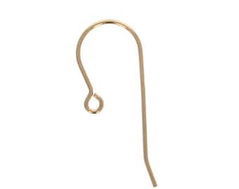 May include: Gold-toned earring hook with a small loop at the top and a long, straight wire extending from the loop.