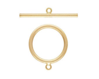 May include: Gold-toned metal toggle clasp with a round ring and a straight bar. The clasp is used for necklaces, bracelets, and other jewelry.