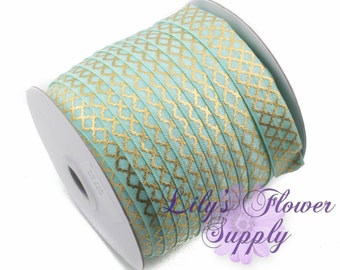 Vikbart resårband, FOE, Vikbart resårband, Resårband i metervara, FOE-resårband, 5/8-tums resårband, Grossistresårband, Aqua Gold Quatrefoil, Resårband