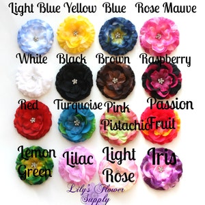 May include: Assortment of 15 fabric flower hair clips in various colors, including light blue, yellow, blue, rose, mauve, white, black, brown, raspberry, red, turquoise, pink, passion fruit, lemon green, lilac, light rose, and iris. Each flower has a rhinestone center.