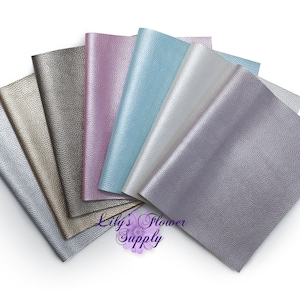 May include: A variety of metallic faux leather sheets in different colors, including silver, gold, pink, blue, and gray. The sheets are arranged in a fan shape, with the text "Lily's Flower Supply" visible at the bottom.