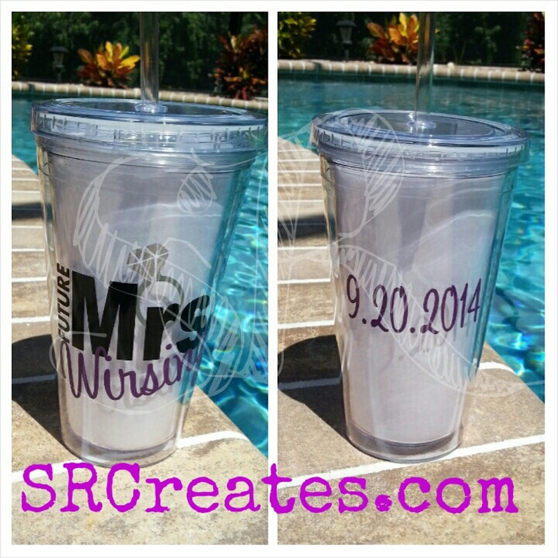 May include: Two clear plastic tumblers with lids and straws. One tumbler has the text "Future Mrs. [Name]" and the other has the date "9.20.2014".