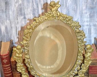 Antique Gilded Bronze Large Vanity Mirror with Figural Cherubs on Marble Base