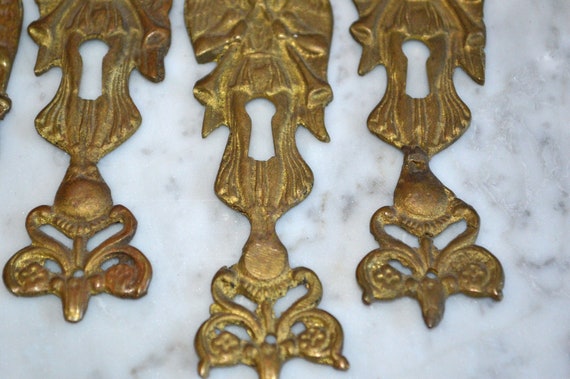 One Antique French Brass Floral Vase Urn Keyhole Escutcheon