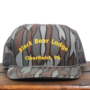 Vintage Black Bear Hunting Lodge Deer Fishing Outdoorsman Camp Clearfield PA Pennsylvania Camo Camouflage Trucker Hat Snapback Baseball Cap