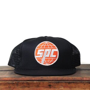 Vintage zwarte SPC Globe-logo patch initialen snapback baseballcap truckerhoed