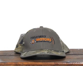 Vintage Highway Motors Inc Heavy Duty International Trucks Dealer Mossy Oak Camo Camouflage Hunting Strapback Hat Baseball Cap