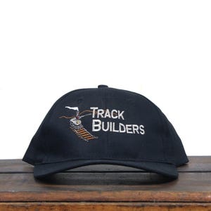 ヴィンテージ 90年代 ストラップバックハット ベースボールキャップ トラックビルダー 鉄道建設 貨物列車 鉄道ハードウェア 標識 信号 鉄道 RR シング