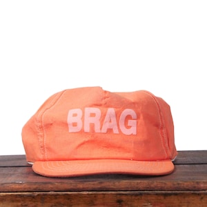 Vintage Minimal BRAG Random Word Simple Neon Orange Snapback Trucker Hat Baseball Cap Made In USA