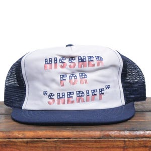 Vintage Hissner For Sheriff Police Law Enforcement Cops Trooper Stars & Stripes American Flag Letters Snapback Trucker Hat Baseball Cap