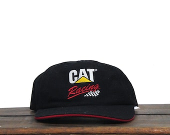 Vintage jaren 90 ongestructureerde strapback hoed baseballcap licentie Cat Diesel Power Nascar Caterpillar Racing bouwmachines Mark Burton