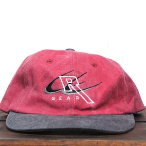May include: Red and black baseball cap with a white embroidered logo that says "R GEAR".