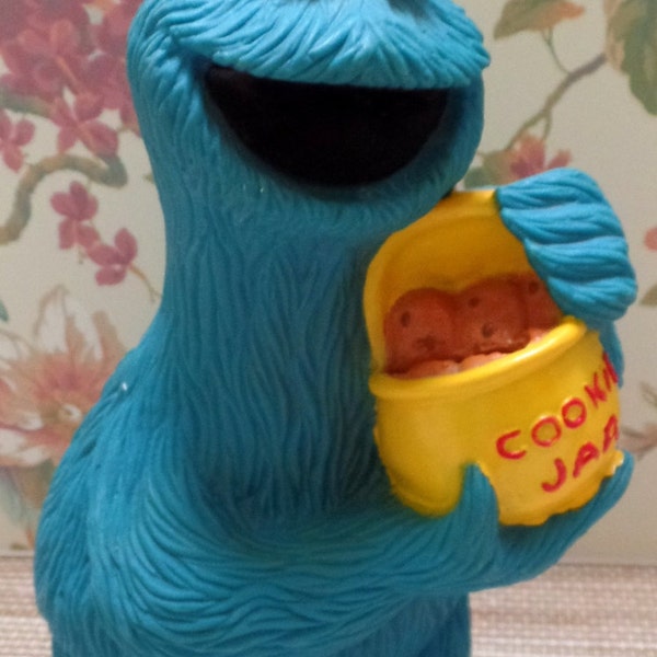 Vintage, Sesame Street, Cookie Monster Vinyl Bank.  Cookie is made of vinyl, and needs a stopper in the bottom to hold the coins in
