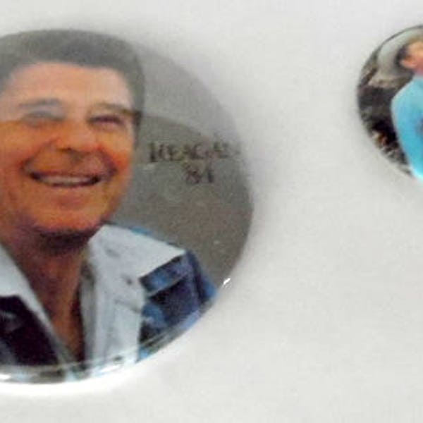Pair of 1980's Ronald Reagan pinback buttons,  Reagan in cowboy hat, leisure suit,  US Presidents,  collector pins, collectible pin backs
