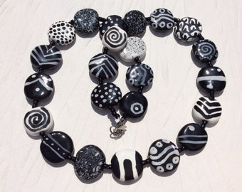 Kazuri Black and White Statement Necklace, Fair Trade Beads. Hypoallergenic Stainless Steel Clasp, Handmade One of a Kind