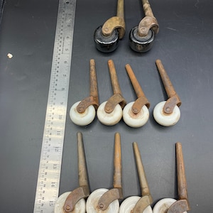 Vintage Casters with black and white wheels, Antique Casters