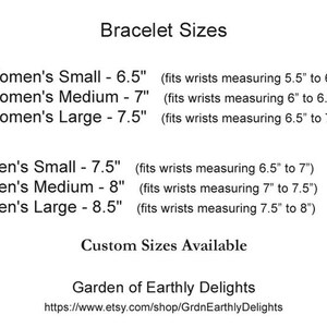 May include: A chart showing bracelet sizes in inches for both men and women. The chart lists the size, length, and wrist measurement for each size. The chart also includes the text "Custom Sizes Available" and the website address for Garden of Earthly Delights.