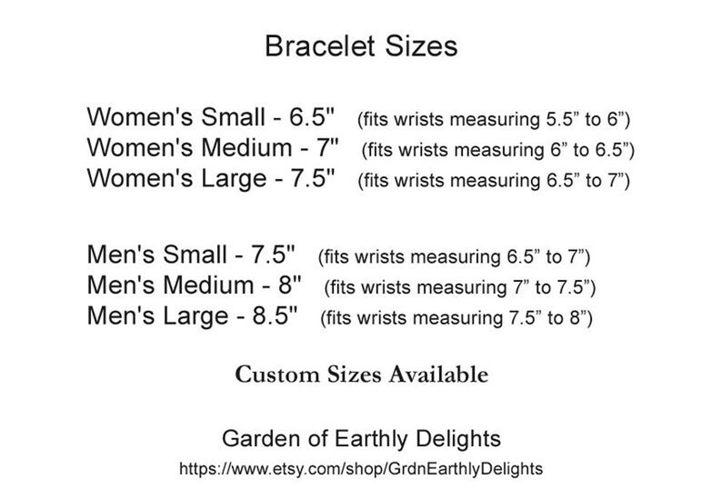 May include: A chart showing bracelet sizes in inches for both men and women. The chart lists the size, length, and wrist measurement for each size. The chart also includes the text "Custom Sizes Available" and the website address for Garden of Earthly Delights.