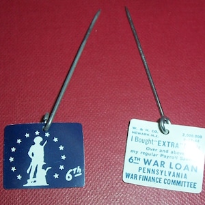 2 World War II war bonds lapel pins, PA