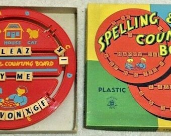 Vintage toy spelling board, in box