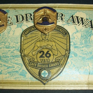 Vintage NSC safe driver award card with 2 pins attached