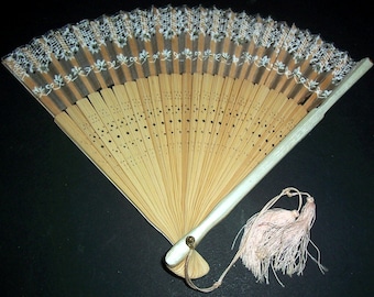 Vintage celluloid folding fan