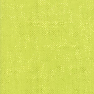 May include: A solid green fabric with a subtle white polka dot pattern. The fabric has a slightly textured surface.