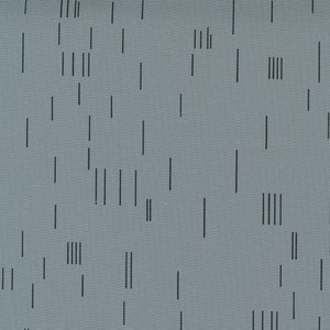 May include: A gray fabric with a repeating pattern of black vertical lines. The lines are of varying lengths and are arranged in a random pattern.