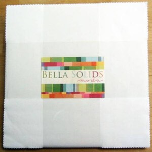 May include: A stack of white fabric squares with a colorful label that reads "BELLA SOLIDS moda". The fabric is neatly folded and appears to be new. The label features a vibrant array of colors.