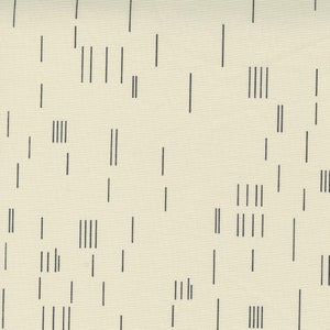 May include: Cream-colored fabric with a repeating pattern of vertical black lines. The lines vary in length and are arranged in a seemingly random, yet organized, manner. The fabric has a subtle texture.